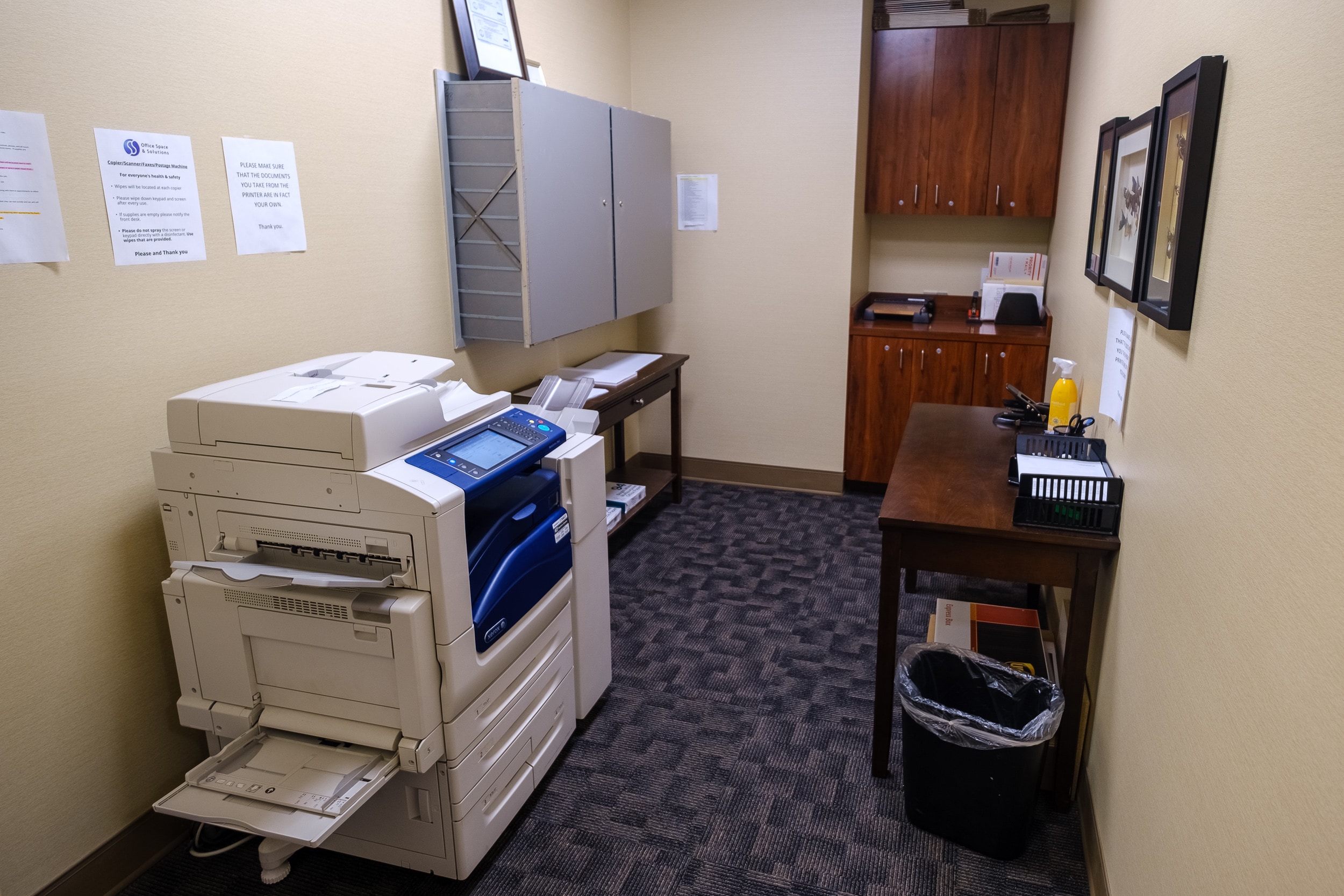 OSS Administrative Services Wells Fargo Center. Copying room with storage and various document processing stations, equipment and supplies.